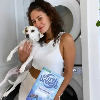 At the washing machine with an Earth Breeze pack